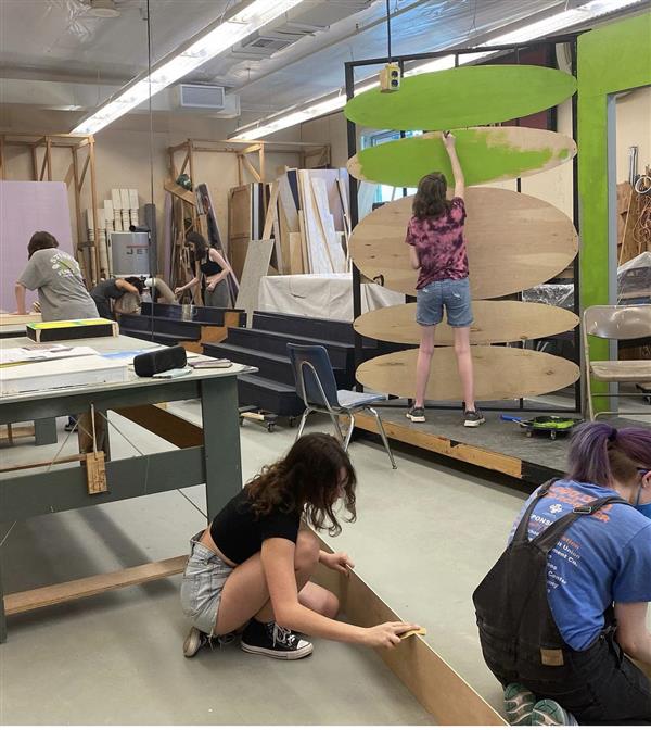 Students work on set design